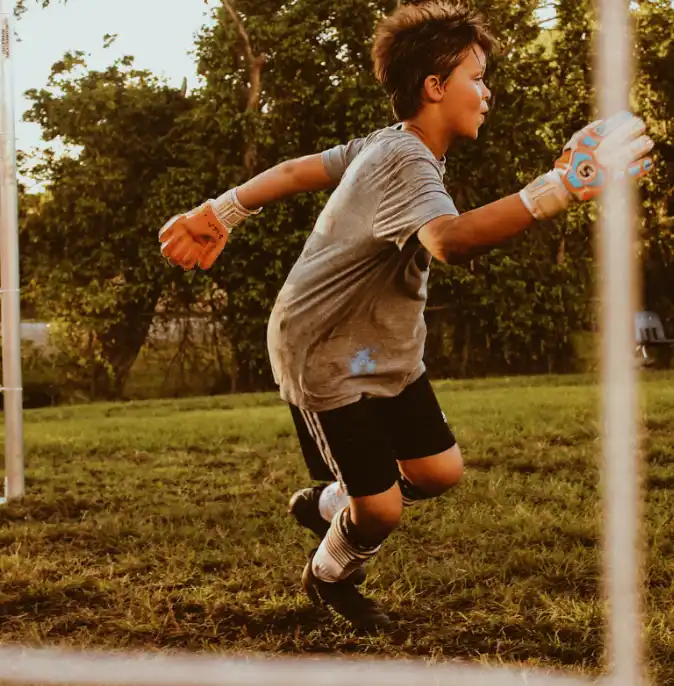 Boy playing football