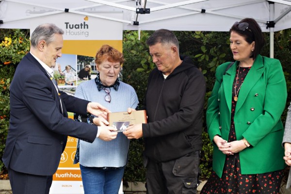 Locals receiving their Award Plaque