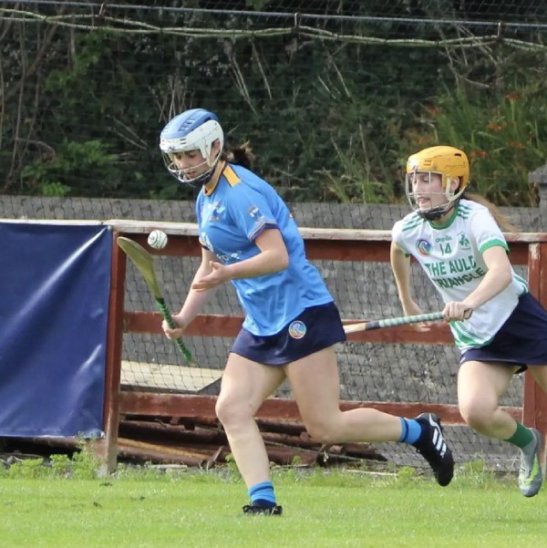 Salthill Knocknacarra camogie player races away from an opponent